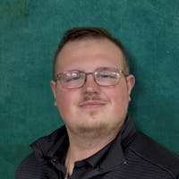 Austen Vroman at Auto Outlets of Farmington & Electric Car Corner