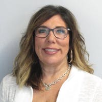 Photo of Caryn de la Rosa, Finance Director